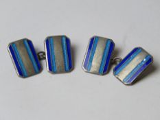 A pair of blue guilloche enamel silver cufflinks.