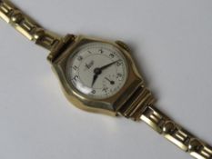A 9ct gold ladies Avia cocktail wristwatch on 9ct gold articulated strap, hallmarked 375 throughout,