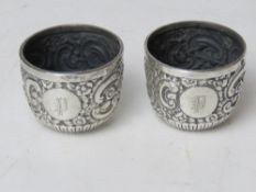 A pair of HM silver salts having repoussé design throughout and hallmarked London 1896, 79.3g / 2.