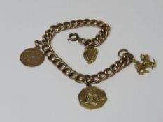 A vintage 9ct rose gold charm bracelet, stamped 9c to links, replacement brass clasp,