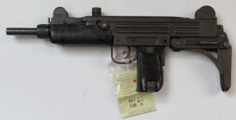 A deactivated Uzi 9mm sub machine gun.