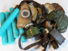 Five RPG rocket tail transit tubes, Soviet cold war gas mask and filter, k98 cleaning kit tin,