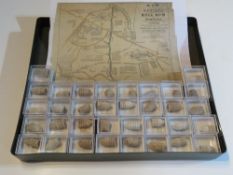 A quantity of bullet / musket balls in boxes.