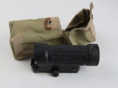 An Elcan 4 x reticle scope with Picatinny mount in US Military pouch.