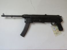 A deactivated Yugoslav M56 7.62mm sub machine gun.