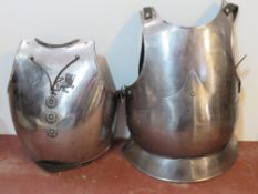 Two decorative reproduction Civil War front armour plates with straps.