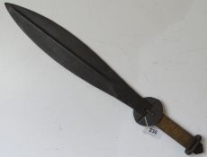 A leaf shaped blade bearing inscription 'Dros Urddas Cymru' (For the honour of Wales) upon.