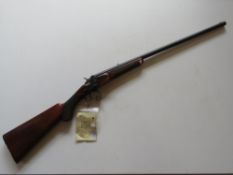 A deactivated French .22LR single shot rifle, with octagonal barrel.