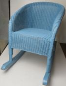 A Lloyd Loom Collection child's rocking chair bearing label for Vincent Sheppard.