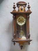 A Vienna type wall clock having brass di