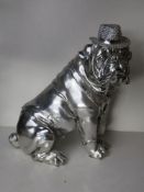 A large chrome painted bulldog wearing '