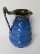 A Denby ware blue and green glazed jug s
