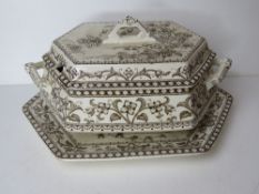 A large lidded tureen with matching tray