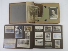 Two military themed photograph albums.