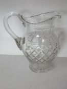 A large cut glass jug overall height app