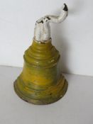 An antique cast metal doorstop in the fo