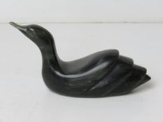 An Inuit green soapstone carving of a bi