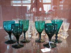 A pair of emerald green coloured glasses