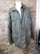 A 100% cotton coat having corduroy colla