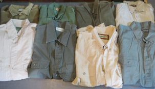 Eight assorted men's shirts in shades of