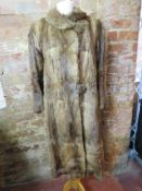 A vintage Musquash London made 3/4 lengt
