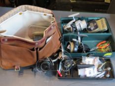 A quantity of fishing equipment inc reels, flys, hooks, etc, within bag and plastic case.
