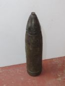 An LEIG18 7.5cm HE shell with steel fuse