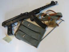 A deactivated PPS-43 SMG and accessories