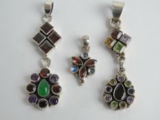 Three modern silver gem set pendants, longest 5.6cm inc bale.