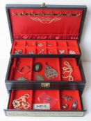 A quantity of silver and costume jewellery within a Mele vintage leatherette jewellery box inc