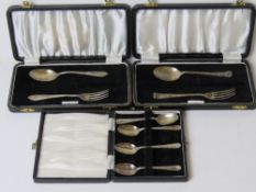Two hallmarked silver Christening sets comprising spoon and fork,