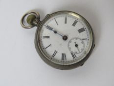 An 800 silver fob watch having white enamel dial with subsidiary seconds dial, 37mm dia,
