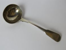An HM silver short ladle weighing 63.1g / 2.03ozt.