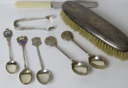 A pair of short HM silver sugar tongs,