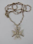 A silver filigree Maltese Cross pendant, 2.