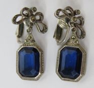 A pair of vintage Sterling silver Art Deco earrings having octagonal cut blue stone suspended below