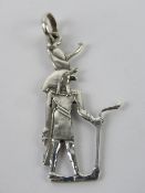 A Horus pendant having Arabic hallmark upon and measuring 4.1cm inc bale.