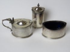 A HM silver cruet set comprising pepperette,