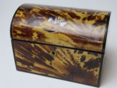 A faux tortoiseshell stationery box opening to reveal wood-lined compartment within, a/f.