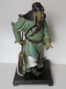 A Christopher W Limited Edition figurine of a Japanese warrior, stood on hardwood base, a/f.