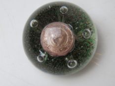 A North Irish Horse themed hand blown glass paperweight.