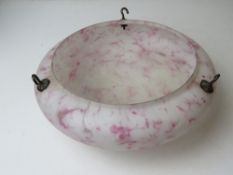 An early 20thC glass ceiling light shade in pink and white.