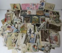 A large collection of early 20th century postcards including decoupage type sachets, novelty cards,