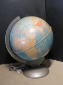 An oversized lit teaching globe, untested.