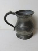 A pewter tankard marked for Yates & Birc