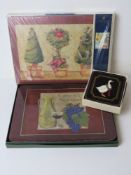 Two sets of coasters, one by Pimpernel,