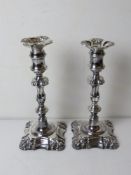 A fine pair of silver plated candlesticks.