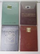 Four commemorative Australian stamp albums for 1986, 1987, 1989, and 1990.