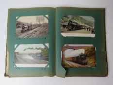 An Art Nouveau postcard album containing a quantity of Railwayana postcards and having hand painted