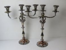 A pair of large and impressive silver plated candelabrum each having three sconces upon,